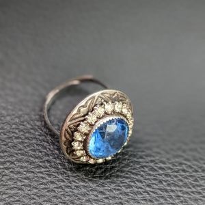 Sterling silver ring w/diamonds & blue gem. Sz7
